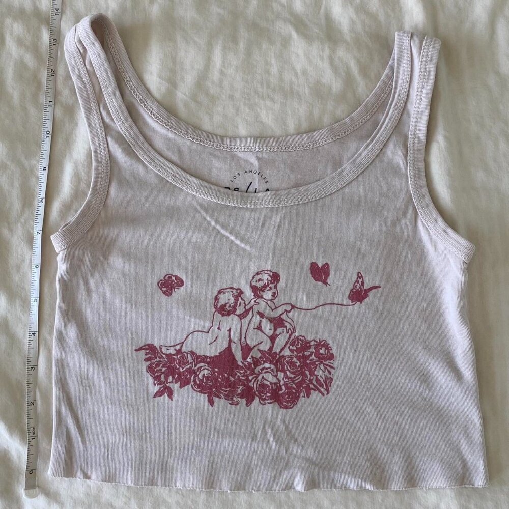 pastel/light pink angel tank
